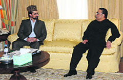 Hurriyat Conference chairman Mirwaiz Umar Farooq with Pakistan president Asif Ali Zardari in the US on Friday. A Tribune photograph
