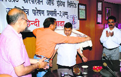A powergrid official being felicitated during a function in Jammu on Saturday. A Tribune Photograph