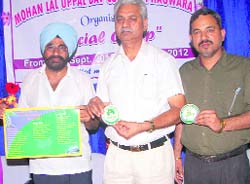 Environmentalist Malkiat Singh Ragbotra and others at the inauguration ceremony of NSS camp at the DAV College.