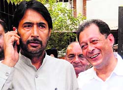 MLA Ghulam Ahmed Mir and former minister Raman Mattoo