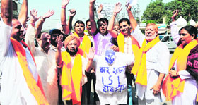 Activists of the Shiv Sena Azad shout slogans against the Babbar Khalsa Organisation in Amritsar on Sunday.