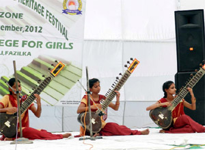 Students playing sitar during the Panjab University Zonal Youth Festival held at the National Girls College, Fazilka. 