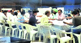 Counting of votes for Senate elections in progress at the Gymnasium Hall, Panjab University, on Sunday