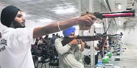 Shooters take aim at shot during the ongoing 48th Punjab State Shooting Championship at the PRSA Range, Sector 56, in Mohali on Sunday