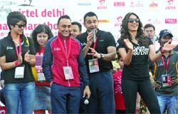 Actors Gul Panag, Rahul Bose and Bipasha Basu cheer the participants at Jawahar Lal Nehru Stadium in New Delhi on Sunday.