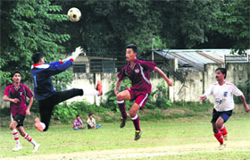 A match in progress during the Dehradun District Football League in Dehradun on Sunday.