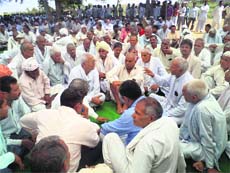 A mahapanchayat in progress at Dhawana village of Rewari district on Sunday. 