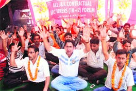 Contractual lecturers protest in support of their demands in Jammu on Sunday