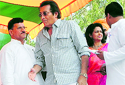 Three-time MP Vinod Khanna, former state minister Master Mohan Lal and Khannas wife and BJP executive committee member Kavita Khanna at the Yuva Morcha rally at Pathankot on Sunday
