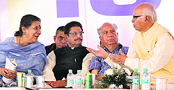 Senior BJP leader LK Advani in conversation with Information and Broadcasting Minister Ambika Soni at the Shaheed Parivar Fund function in Jalandhar