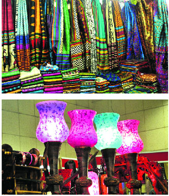 A silk stall (above) and colourful lamps.