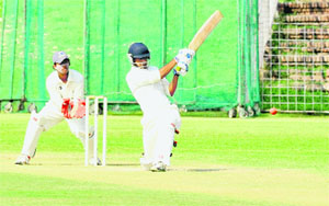 An Odisha batsman plays a shot in a match against West Bengal during the Second All-India Invitation Cricket (U-19) Tournament at the Cricket Stadium in Sector 16, Chandigarh, on Monday. 