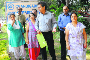 Kashmiri migrants hold a protest outside the UT Secretariat in Chandigarh on Monday. 