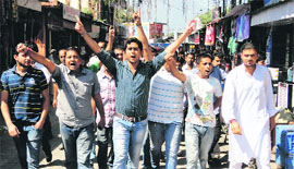 Youth Congress workers stage a protest at Reasi on Monday. 