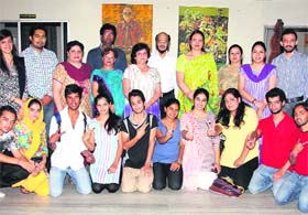 Students of the Apeejay College of Fine Arts, Jalandhar, in a jubilant mood after winning first prizes in the folk orchestra and one-act play competitions during the ongoing Zonal Youth Festival of Guru Nanak Dev University, Amritsar. 