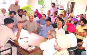 ACP (North) Swapan Sharma at a meeting with officials and market association members in Ludhiana on Monday