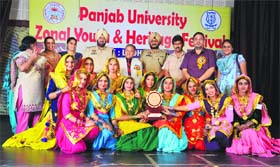 Students of GGN College pose with the winning trophy in Khanna on Monday