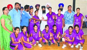 Winners of the IMG-Reliance Punjab State Schools Basketball League strike a pose in Ludhiana