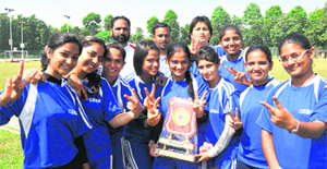 Players of the Chandigarh team with the 37th North Zone Ball Badminton Championship trophy in Chandigarh on Tuesday.