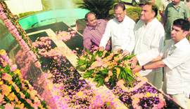 Chief Minister Vijay Bahuguna and chief of the state unit of the Congress Yashpal Arya pay tributes to the martyrs of the Rampur Tiraha incident on Tuesday.