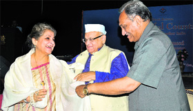 Uttarakhand Governor Aziz Qureshi and Chief Minister Vijay bahuguna honour Syeda Hameed on the release of her book at a function in Dehradun.