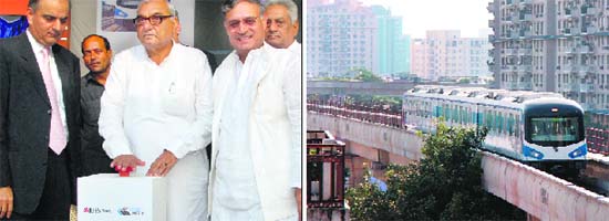 Haryana Chief Minister Bhupinder Hooda gives the green signal to Rapid Metro (right), which had its trail run on Tuesday