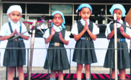 Students recite a patriotic poem during the Gandhi Jayanti celebrations at GHG Academy in Jagraon on Tuesday.