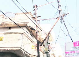 In the absence of any support, a streetlight pole was temporarily tied to an adjoining pole near Joshi Colony in Amritsar