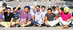 Members of the Panjab University Students Union (PUSU) stage a dharna outside the Vice-Chancellors office in Chandigarh on Wednesday