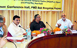 Members of the Protection of Plant Varieties and Farmers Rights Authority of India along with the members of the Sher-e-Kashmir University for Agricultural Sciences and Technology during an awareness programme for the farmers at Dak Banglow in Rajouri