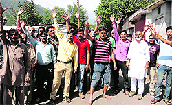Members of the all-party union hold a demonstration to seek tehsil status for Arnas