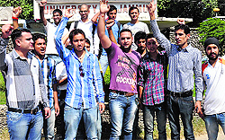Activists of NSPU hold a protest at the University of Jammu on Wednesday