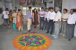 The dignitaries taking a look at a rangoli made at the techno-cultural fest, Tarannum, that began at the PTUGZS campus in Bathinda on Thursday.