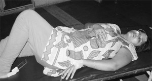 Reena, who allegedly poisoned her daughter and consumed poison later, lying on a stretcher at the General Hospital in Panchkula on Thursday.