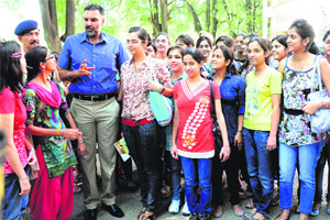 UT SSP Naunihal Singh interacts with students at MCM DAV College, Sector 36, in Chandigarh on Thursday. 