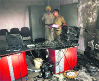 A gutted Telephone Exchange office at Sector 48 in Chandigarh after a fire broke out there on Thursday.