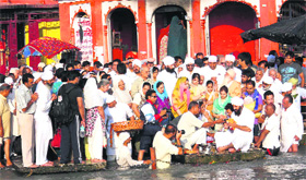 Ashes of Guru Mata Chandan Deyi, mother of Maharaj Darshan Das, being immersed in the Ganga at Brahm Kund in Haridwar on Thursday.
