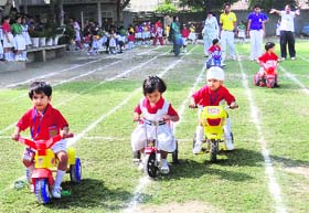 Children of Tagore School take part in a cycle race during their annual sports meet in Karnal. 
