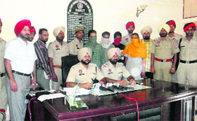 Accused in police custody at Raikot on Thursday. 