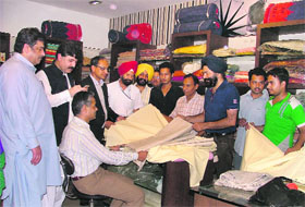 Members of the Pakistani delegation visit a shop in Ludhiana on Thursday.