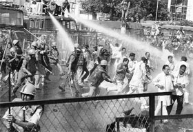 The police uses water cannons to disperse Congress activists who were staging a gherao of Madhya Pradesh Chief Minister Shivraj Singh Chouhans residence in Bhopal on Thursday.