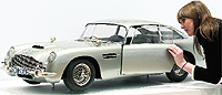 A 1/3 scale replica Aston Martin DB5 used in the film Skyfall seen during the press preview of 50 years of James Bond  The Auction in London