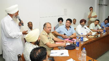 A man lists his grievances at a meeting convened by the commissioner of the panel on Right to Services, Dr Dalbir Singh Verka, in Bathinda on Friday. 