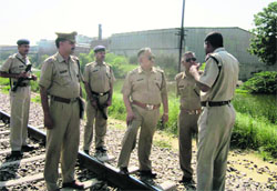 Policemen take stock of the situation after Shatabdi crushed three labourers to death near Bahadurgarh railway station on Friday. Photo by writer