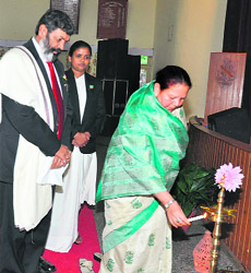Governor Urmila Singh inaugurates an international seminar on Economic, social and environmental challenges of globalisation in Shimla on Friday.
