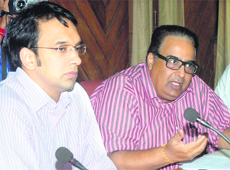 Chief Secretary, state Freedom Fighter Department, Sarvesh Kaushal (right) hears grievances of freedom fighters and their kin in Jalandhar on Friday.