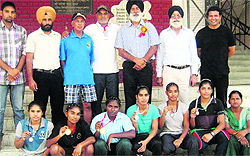 Pugilists of Shere Punjab Sports Academy along with the Indian team boxing coach Gurbax Singh Sandhu (second from right) after the felicitation ceremony