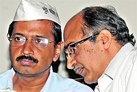 Arvind Kejriwal (L) and Prashant Bhushan in New Delhi on Friday