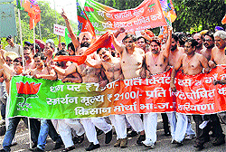 BJP Kisan Morcha workers during a protest march in support of their demands in Chandigarh on Saturday