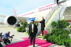 Air India pilot Amitabh Singh (L) and Boeing South Carolina vice president & general manager Jack Jones take part in a ribbon-cutting ceremony to mark the airlines receipt of the first Boeing 787 manufactured at the South Carolina final assembly plant in North Charleston, South Carolina on Friday.  Reuters